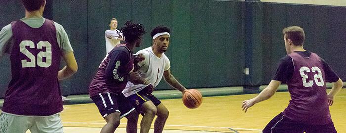 SPU students playing intramural basketball